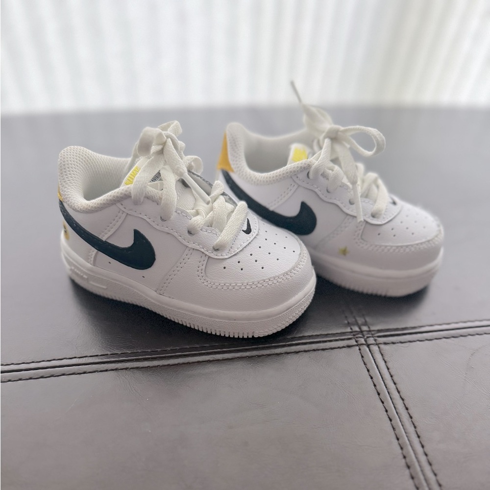 Baby/toddler size 5 “Have a Nike Day” shoes.